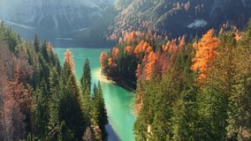 Autumn Aerial View of Lake Braies in Dolomiti Alps in Italy. Alps in Italy on a sunny day in autumnal famous travel destination in the Dolomites, Lago di Braies in the fall - Powered by Shutterstock - Get 15% off with code: PIKWIZARD15