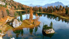 Scenic Lago di Federa in the Dolomites in Italy, autumn in the Dolomites, mirror reflection in the alpine lake in autumn, fall colours in the Dolomites - Powered by Shutterstock - Get 15% off with code: PIKWIZARD15