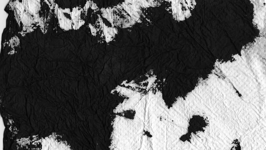 Abstract monochromatic animation of grunge ink-stained papers. Seamless loop. Slideshow. Low frame rate effect.