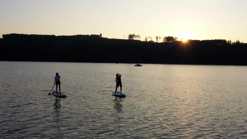Stand up paddle boarding on the Bleilochtalsperre in Thuringia in Germany