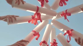 Students are celebrating their graduation by holding their diplomas up in the air forming a circle. - Powered by Shutterstock - Get 15% off with code: PIKWIZARD15