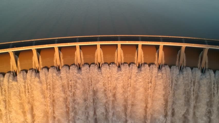 Dam reservoir spillway expelling water, Gariep Dam South Africa, Baffle Blocks 4K 30fps - 30sec