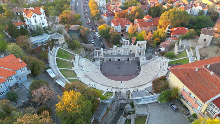 Fantastic aerial shot over the ancient Roman theater of Plovdiv in Bulgaria and during sunrise.