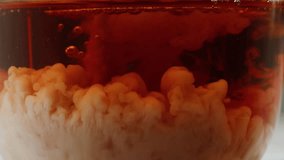 Pouring milk into black english breakfast tea in glass cup. Drinking hot tea with milk, healthy morning, freshly brewed detox drink. - Powered by Shutterstock - Get 15% off with code: PIKWIZARD15