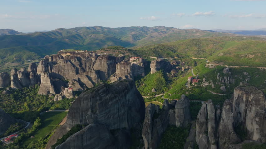 Aerial view of the iconic rock formations and monasteries of Meteora, Greece, a popular tourist destination and a UNESCO World Heritage site