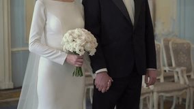 A stunning couple dressed in formal attire joyfully celebrating their wedding day, exuding immense joy and love - Powered by Shutterstock - Get 15% off with code: PIKWIZARD15