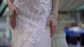 A stunning closeup image of a bridal dress, showcasing intricate floral designs alongside sparkling sequins - Powered by Shutterstock - Get 15% off with code: PIKWIZARD15