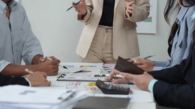 Meeting of a team of passionate Asian businessmen. Creative business team working together in the office Discuss new projects Summary of work results Company annual budget. - Powered by Shutterstock - Get 15% off with code: PIKWIZARD15