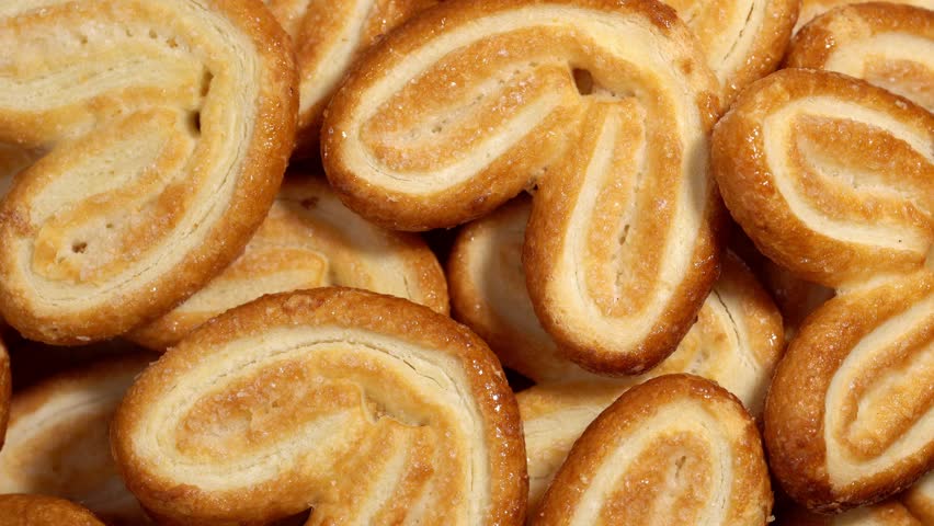 Dessert. Puff pastry cookies spin slowly