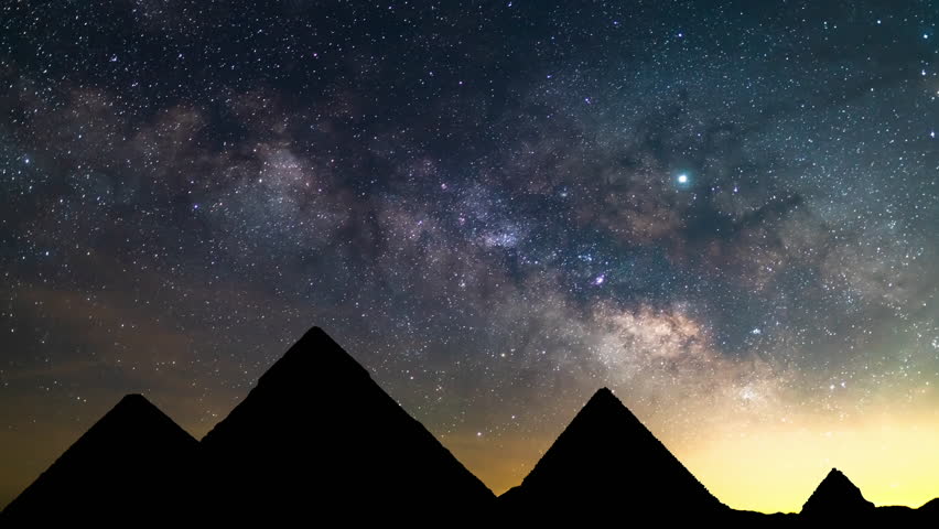Egypt Silhouettes of Milky Way Galaxy Over Pyramids of Giza in the Night Sky