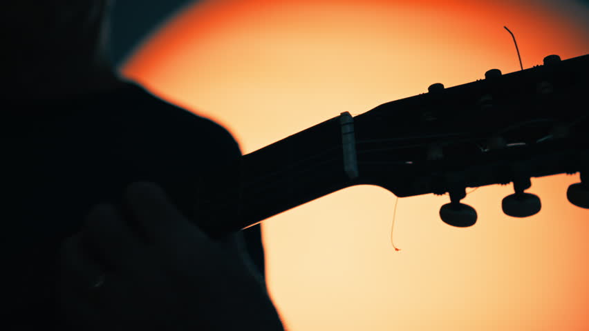 Shadow Defines The Shape Of The Classical Guitar 