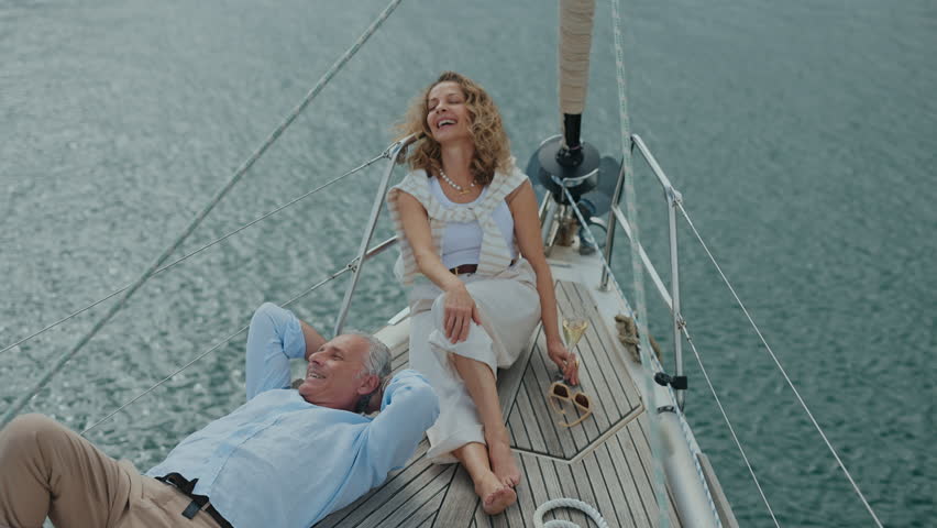 Romantic Meeting Of Stylish Aged Couple On Boat.