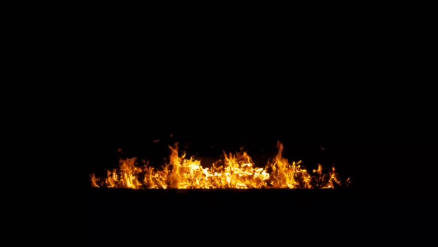 Intense blazing flames rising against dark background with vibrant orange glow. Fire energy concept