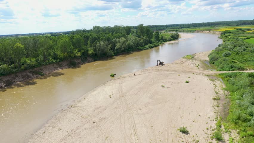 Aerial view of river sand and gravel exploitation, pit, quarry, ballast, ecological impact on environment