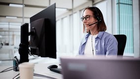 Efficient Customer Care: Smiling Call Center Agent In Busy Office Providing Excellent Service Through Headset For Sales Support - Powered by Shutterstock - Get 15% off with code: PIKWIZARD15