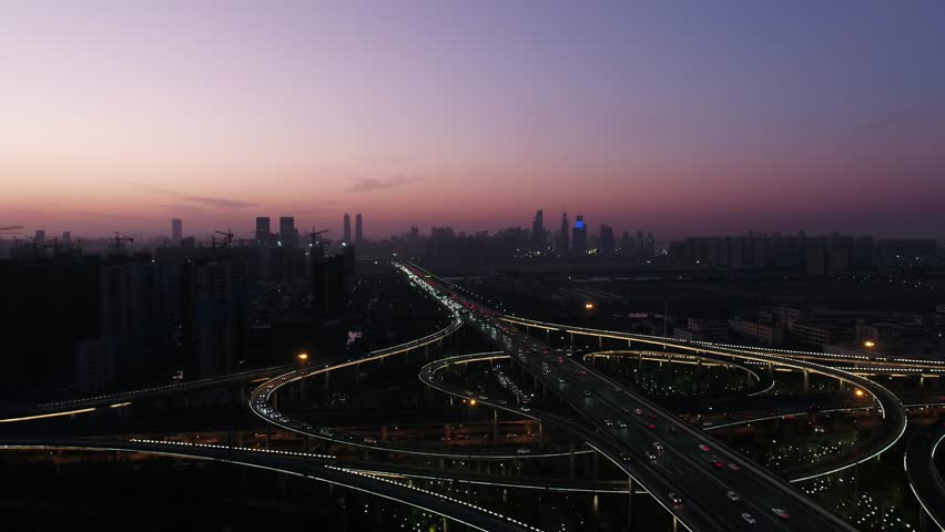 busy traffic road with city skyline