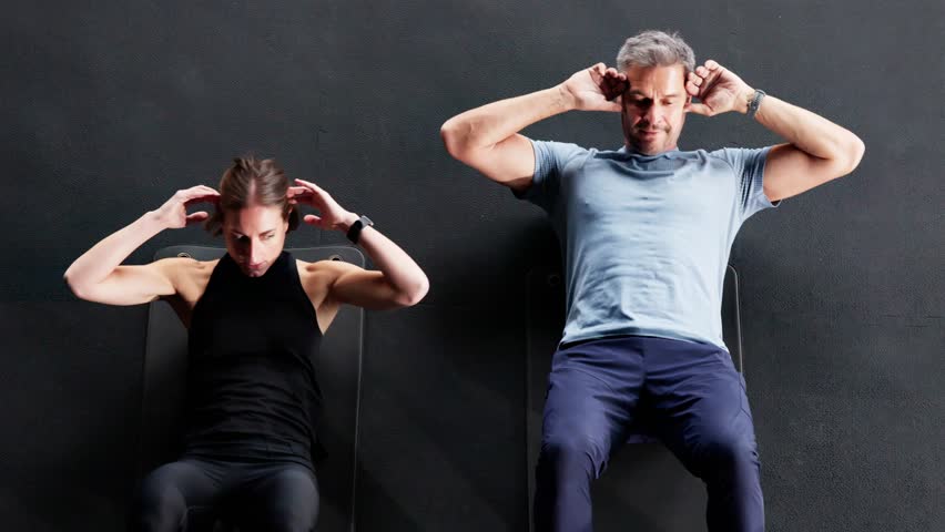 Couple Excercising. Core Fitness Workout. Crunch Training