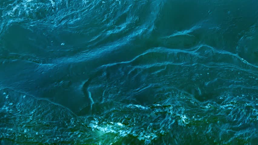 whitewater vortex from above, closeup top view of real wild river water texture, nature scene background for hydroenergy, rafting sports or natural force