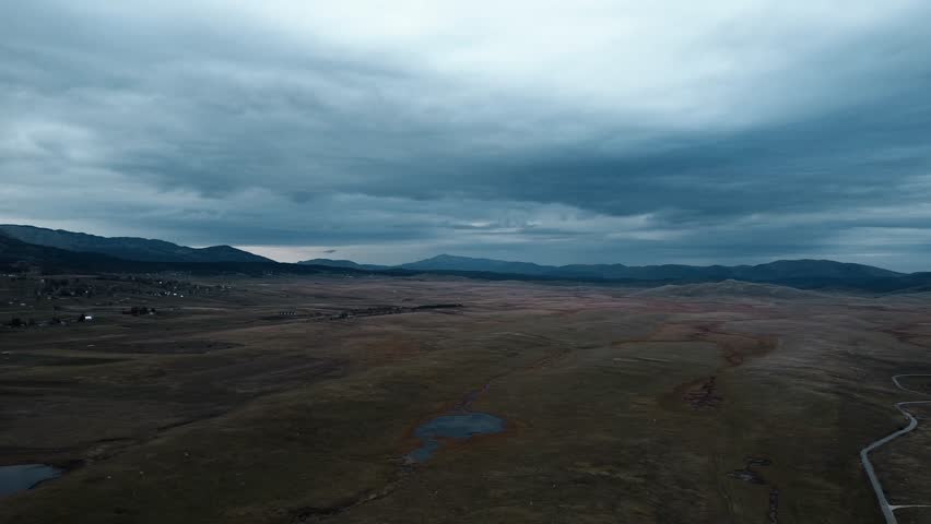 Riblje jezero - Fish Lake- a glacial reservoir in Durmitor National Park, Montenegro country. Panoramic aerial top view from drone. Calm autumn landscape scene