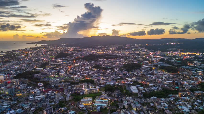 Nago, Okinawa, Japan downtown skyline at sunset.