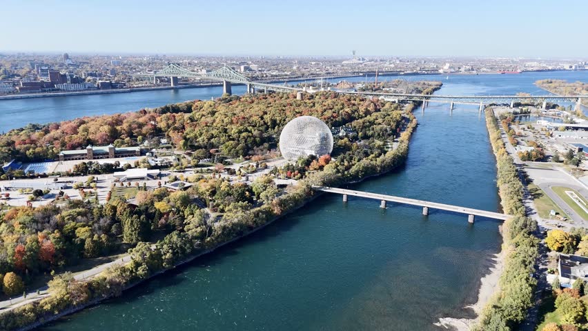 Drone view of autumn Park Jean-Drapeau, biosphere, with the downtown of Montreal in the background. Quebec, Canada