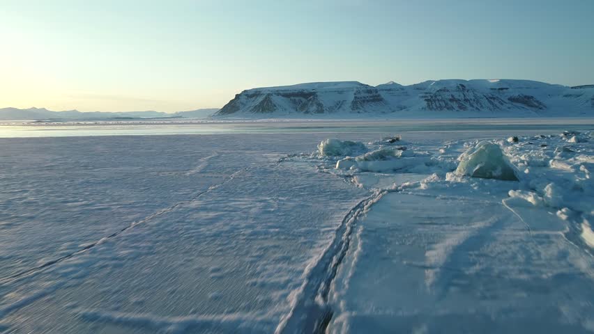 Arctic snowy landscape and ocean, Aerial view of the North Pole winter landscape