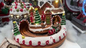 Christmas moving toy decoration in store, wooden train, city decoration. home decor, christmas vibes. wooden toy, christmas gifts - Powered by Shutterstock - Get 15% off with code: PIKWIZARD15