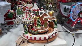 Christmas moving toy decoration in store, wooden train, city decoration. home decor, christmas vibes. wooden toy, christmas gifts - Powered by Shutterstock - Get 15% off with code: PIKWIZARD15