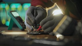 A technician works meticulously on a circuit board, using a soldering iron and multimeter. The workshop is illuminated by soft lights, highlighting various tools and components on the workbench - Powered by Shutterstock - Get 15% off with code: PIKWIZARD15