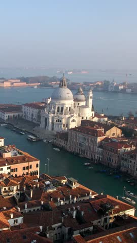 Aerial view of Venice filmed by drone in vertical format (reel) during autumn season.