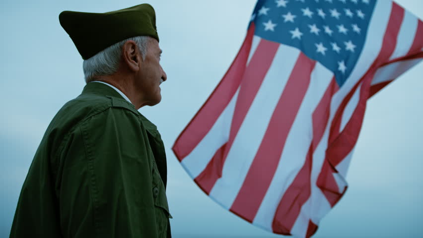 Veteran Soldier Admiring USA Flag 