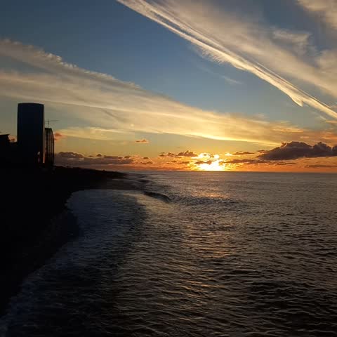 Sunset in Batumi, Georgia on a sea shore of Balck sea