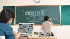 Girl writing engineering prompt by using AI software or programing system to generate AI on table with electronic main board at stem class while smart boy writing software development plan. Pedagogy. - Powered by Shutterstock - Get 15% off with code: PIKWIZARD15