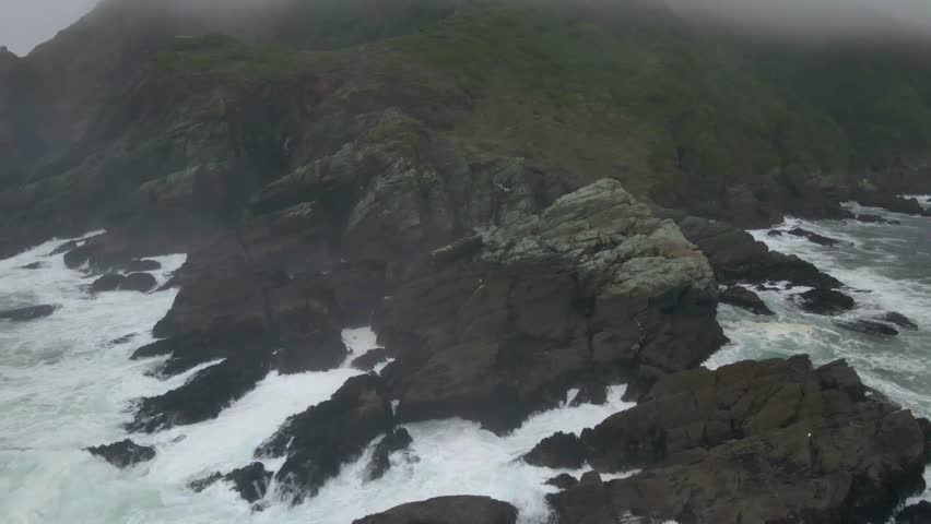 water splashing on rock formation 4K 60fps