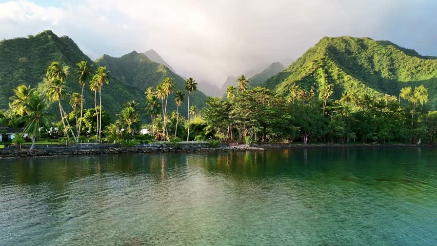 Drone Tahiti. Teahupoo small fishing village in Tahiti island. French Polynesia aerial shot. Mountains and nature. 