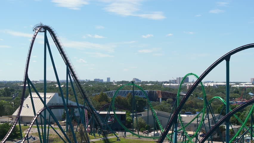 Riding roller coaster at amusement park in Orlando, Florida.