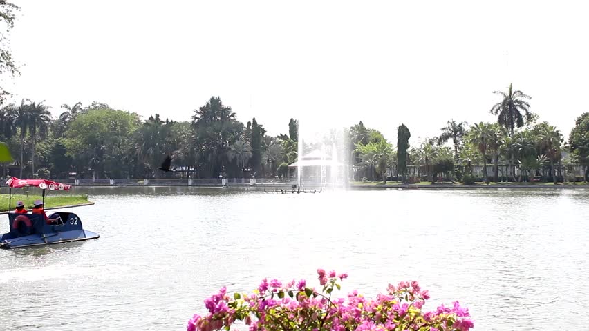 park with boat and fountain