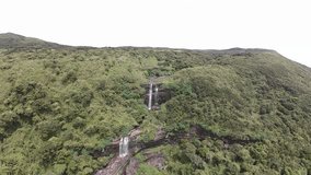 The waterfalls that flow from the mountain peaks today 4k drone footage  - Powered by Shutterstock - Get 15% off with code: PIKWIZARD15