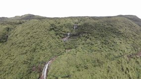 The waterfalls that flow from the mountain peaks today 4k drone footage  - Powered by Shutterstock - Get 15% off with code: PIKWIZARD15
