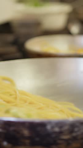 Pan With Pasta Spaghetti Zucchini And Shrimps In The Kitchen Of A Restaurant