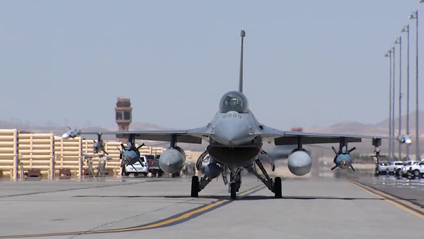 F-16 Fighting Falcons participate in training.