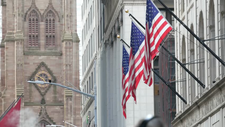 New York City United States. Lower Manhattan Downtown Financial District urban architecture. American Flag, Trinity Church. Wall street Stock Exchange building, USA Stock Market. Hot steam smoke stack