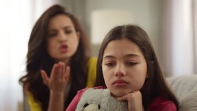 Angry furious Caucasian woman female shouting mother mom yelling parent argument quarrel fighting with little girl sister crying kid daughter cry hug toy indoor room. Family relationship child abuse - Powered by Shutterstock - Get 15% off with code: PIKWIZARD15