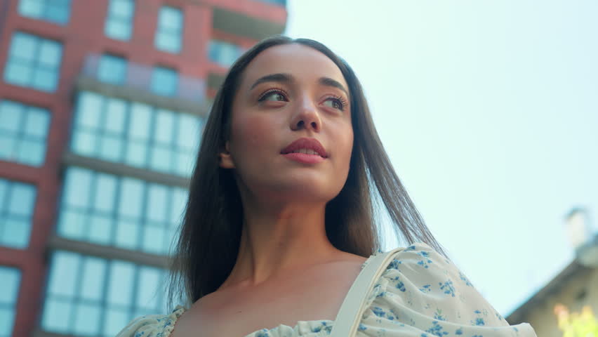 Nervous stressed Caucasian woman female girl client buyer driver nervously looking bag for car keys searching lost key in purse driving automobile failure problem rent auto transport at city street