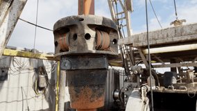 Rotating boer working at the site producing gas. Close up. Drilling equipment at work. - Powered by Shutterstock - Get 15% off with code: PIKWIZARD15