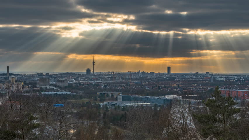 Munich skyline time lapse winter sunset over city centre tv tower in front, munich germany panorama time lapse sunset.