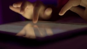 Girl Typing on Touch Screen Digital Tablet at Night. Hands of Person Typing Article Text or Document on Mobile Computer Close Up. Human Hands Typing Text Message Email on Tablet Touch Screen Keyboard. - Powered by Shutterstock - Get 15% off with code: PIKWIZARD15