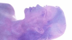 Vertical video. Cosmic portrait. Universe energy. Purple glitter smoke flow in woman silhouette double exposure isolated on white. - Powered by Shutterstock - Get 15% off with code: PIKWIZARD15
