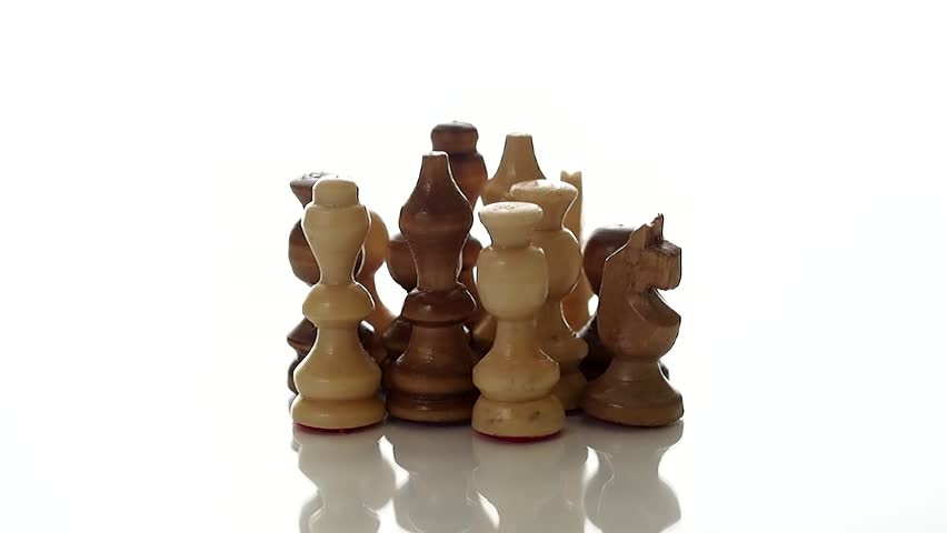 Chess pieces rotating on a white studio background.
