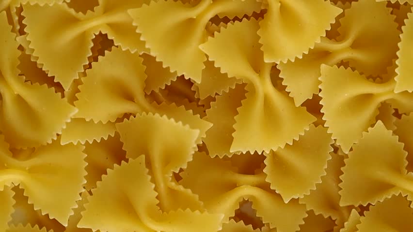 Rotating italian farfalle pasta.